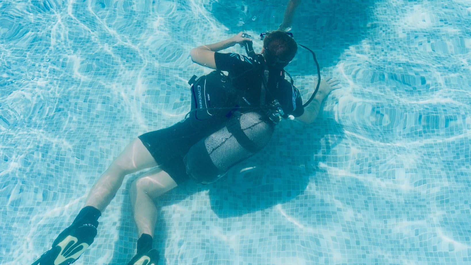 Scuba diver practicing in the training pool at Blue Brothers Diving