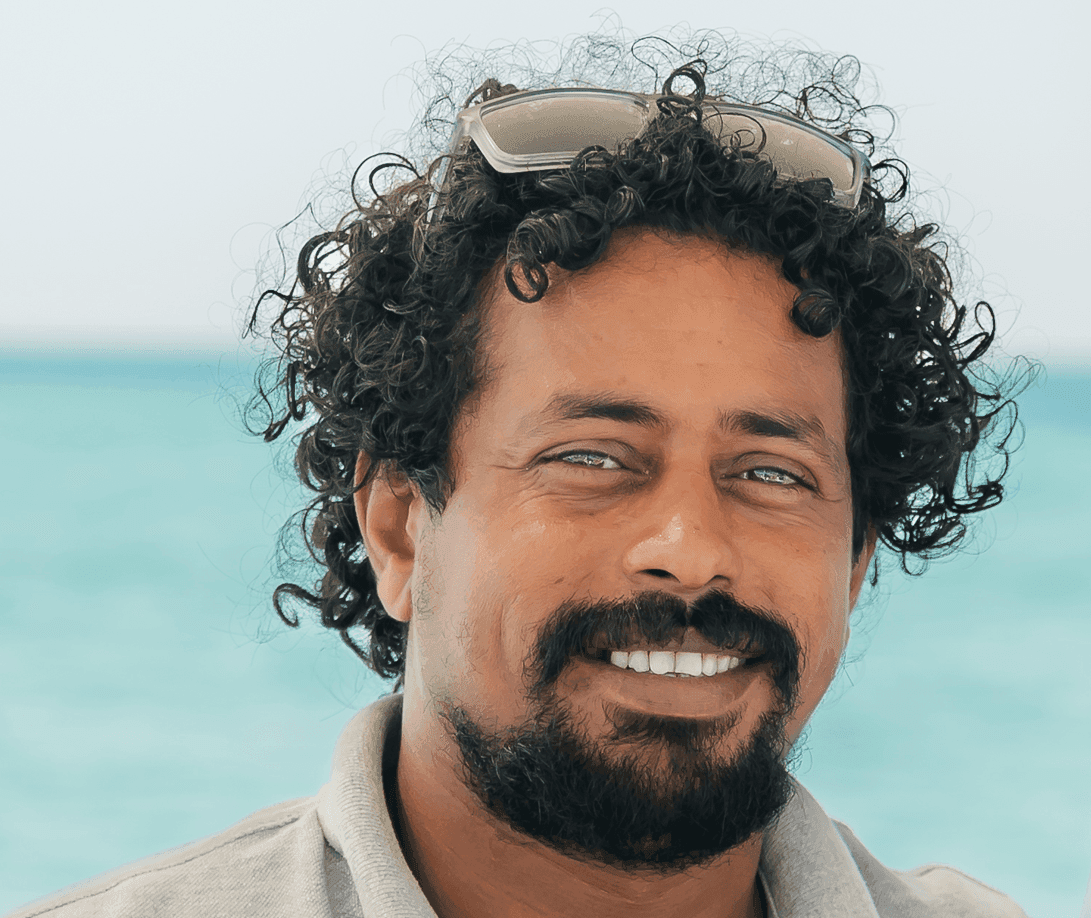 Ahmed from the speedboat team smiling at Blue Brothers Diving