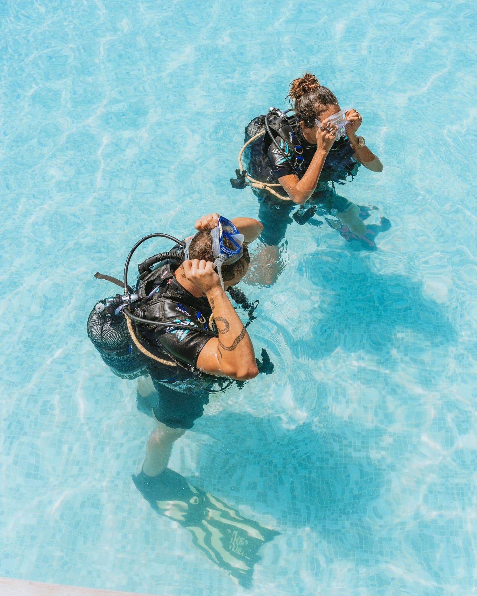 Scuba diver practicing pool skills during PADI Scuba Diver training