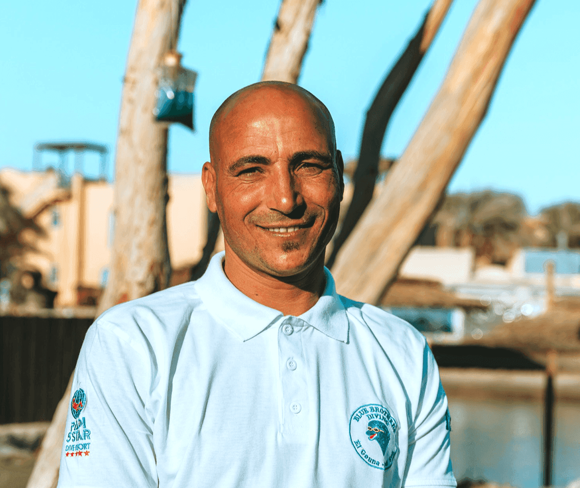 Mahmoud from the Blue Brothers Diving team smiling at the dive center