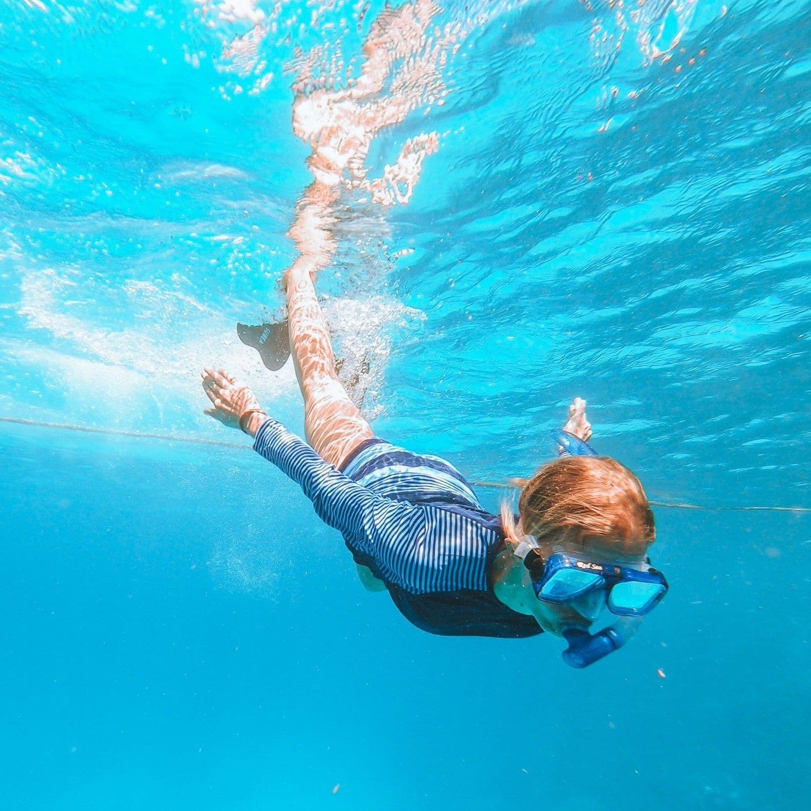Snorkeling guest receiving a briefing before entering the Red Sea