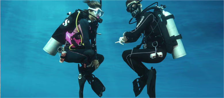 Diver practicing trim and body position underwater