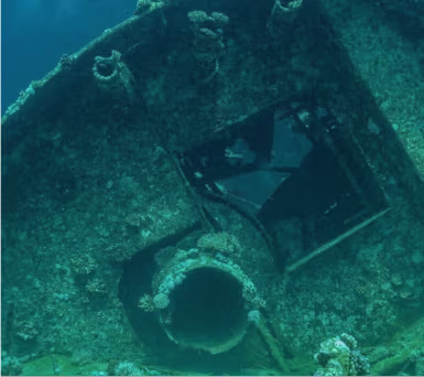 Instructor briefing a wreck dive on the boat
